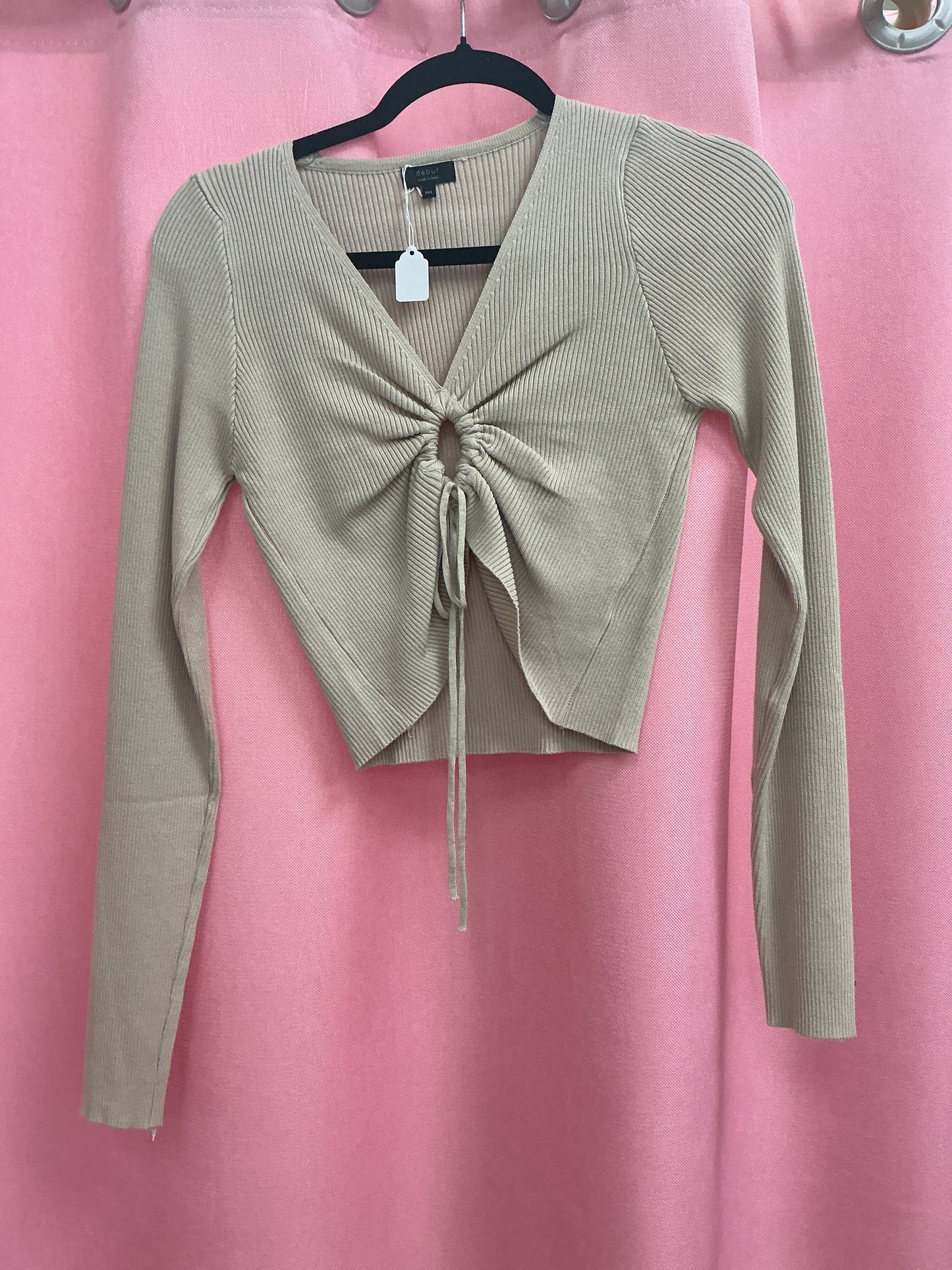 Blusa manga larga con amarre en el medio
