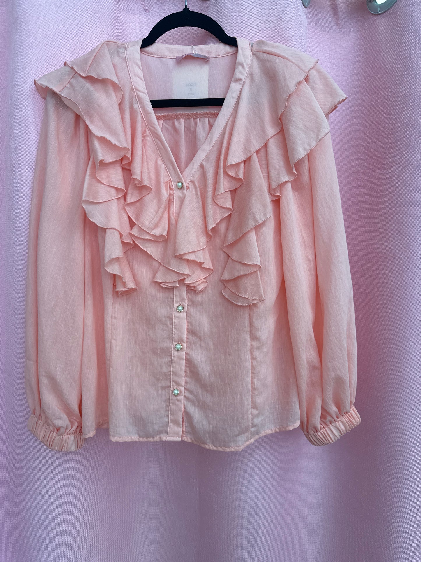 Camisa manga larga con vuelos