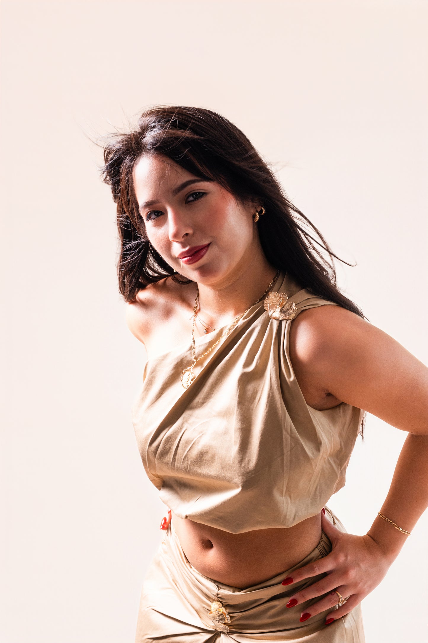 Set (top) y falda arena