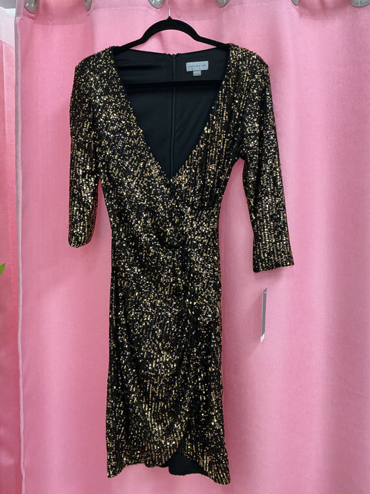 Vestido lentejuelas negras y doradas