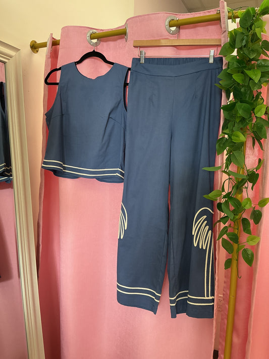 Set ancho con bordado de palmeras