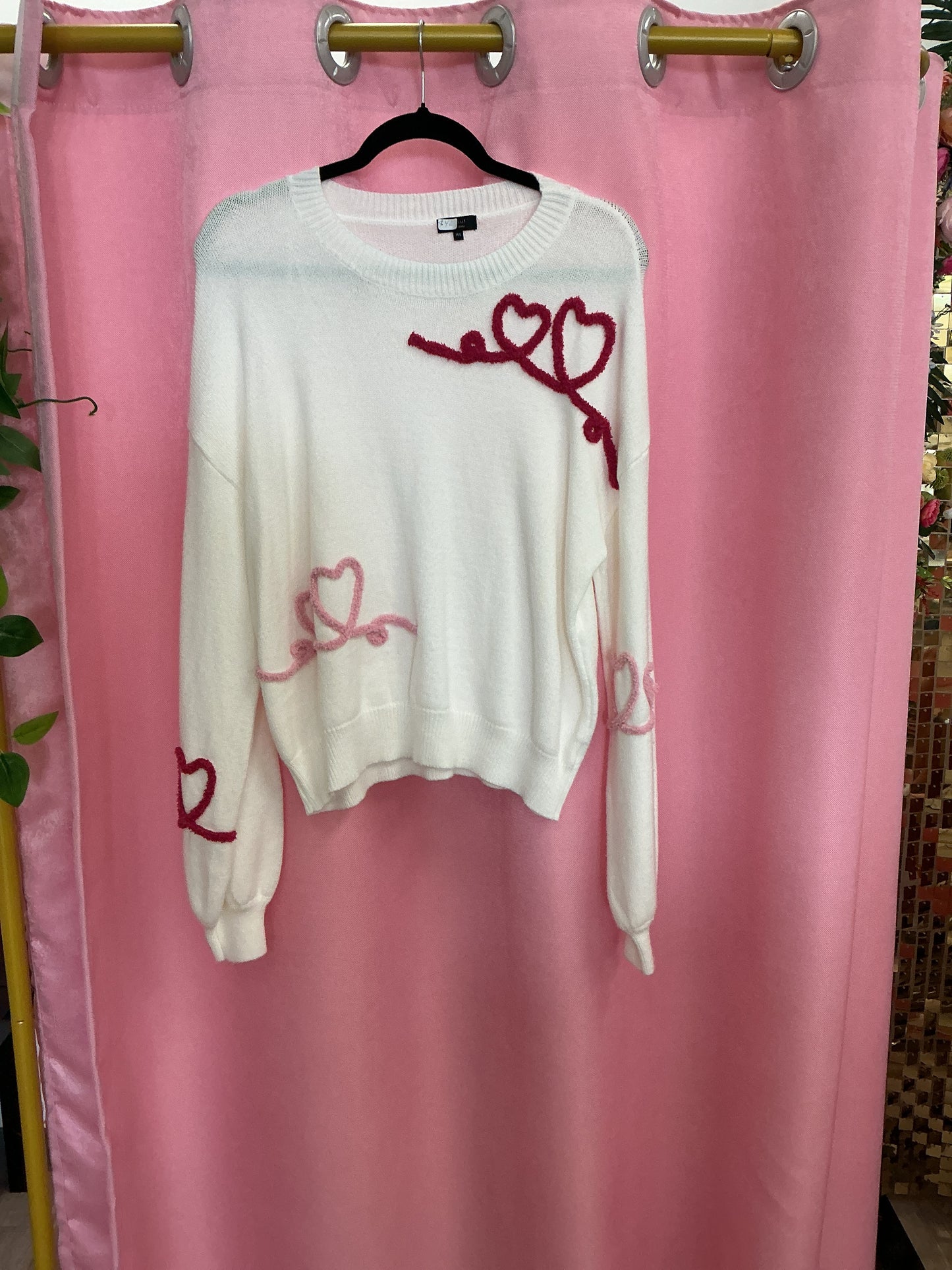 Suéter de corazones