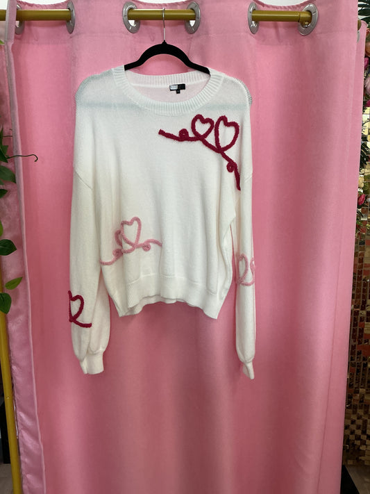 Suéter de corazones