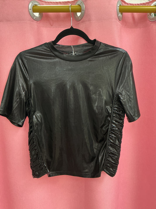 Blusa metalizada con arrufes a los lados